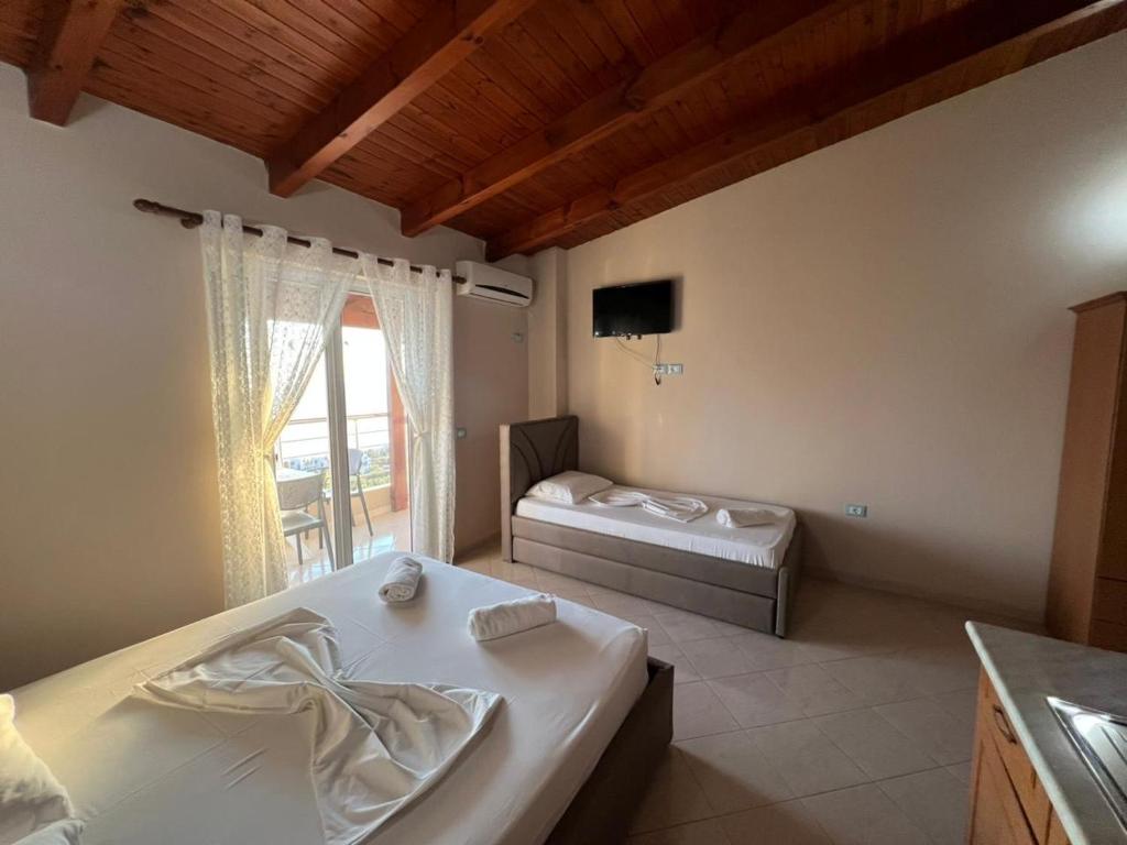 Ένα ή περισσότερα κρεβάτια σε δωμάτιο στο Rahi Room