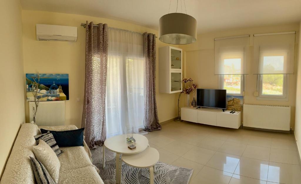 Χώρος καθιστικού στο Urban Gaia Apartment