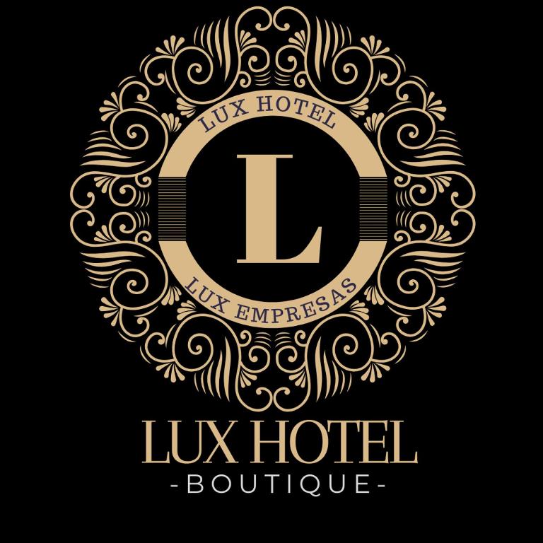 a luxury hotel logo with a letter l in a golden circle at LUX - Hotel Boutique in Andahuaylas