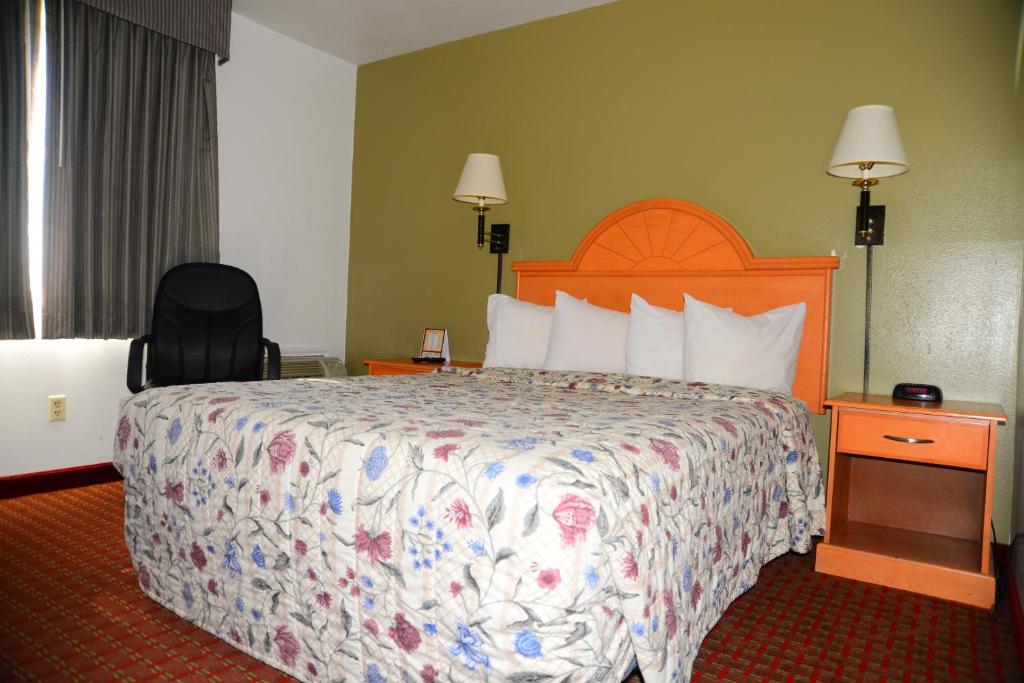 Budget Inn Express - Habitación De La Reina