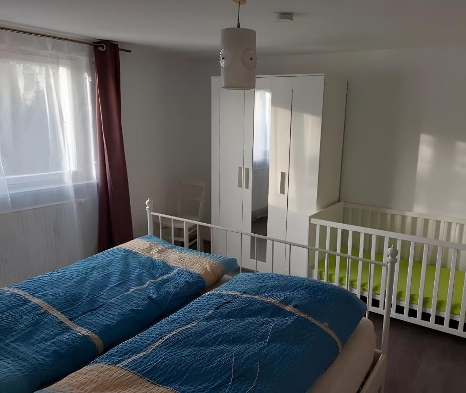 Postel nebo postele na pokoji v ubytování Ferienwohnung Auerhahn