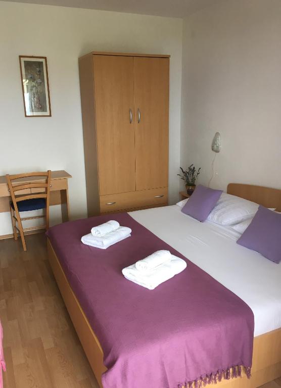 Postel nebo postele na pokoji v ubytování Apartments Wagner