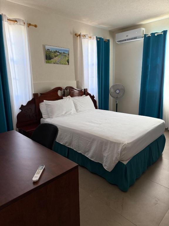 Llit o llits en una habitació de Apartment Parish Land