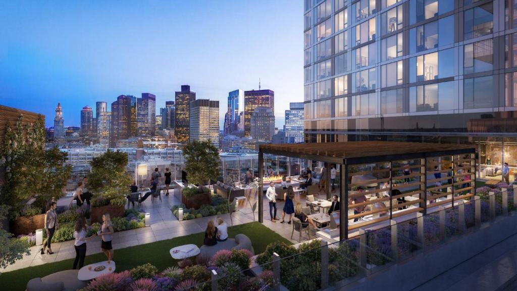 a rendering of the rooftop of a building with a city skyline at Luxury Apt with City Views in Boston