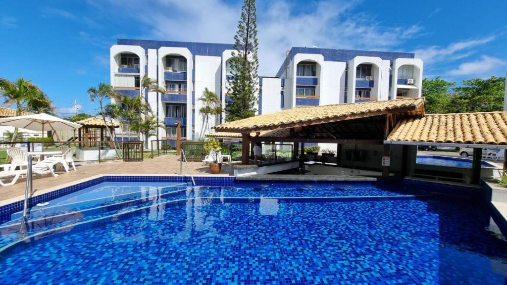 Swimmingpoolen hos eller tæt på Duplex novo e mobiliado em Vilas