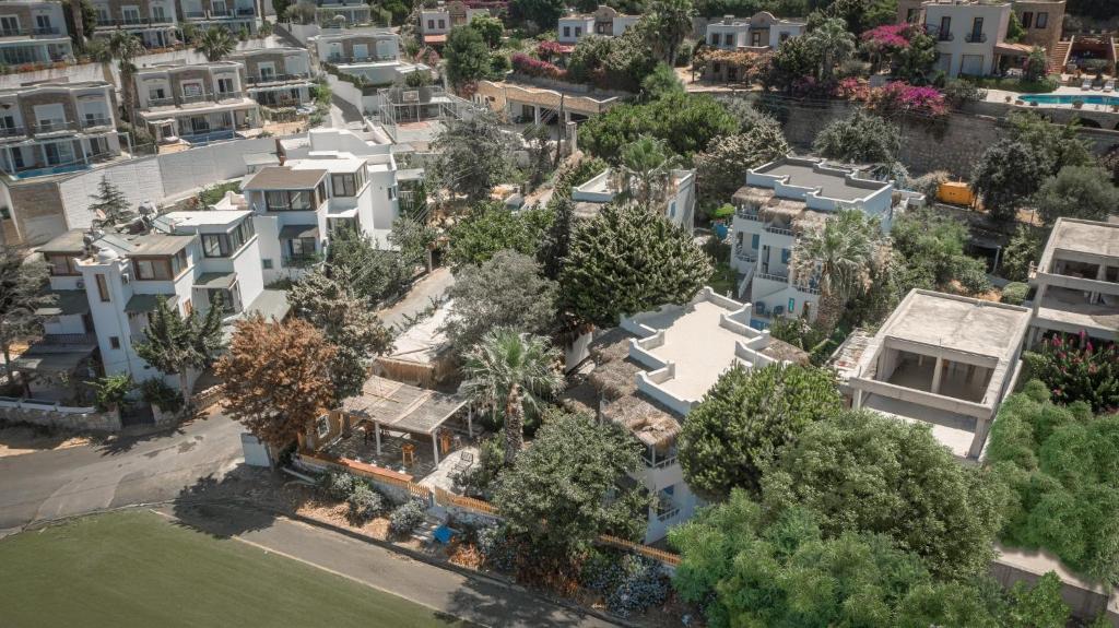 an aerial view of a city with houses at OLO Bodrum Hotel Yalıkavak 8 min Gumusluk 3 min in Bodrum City