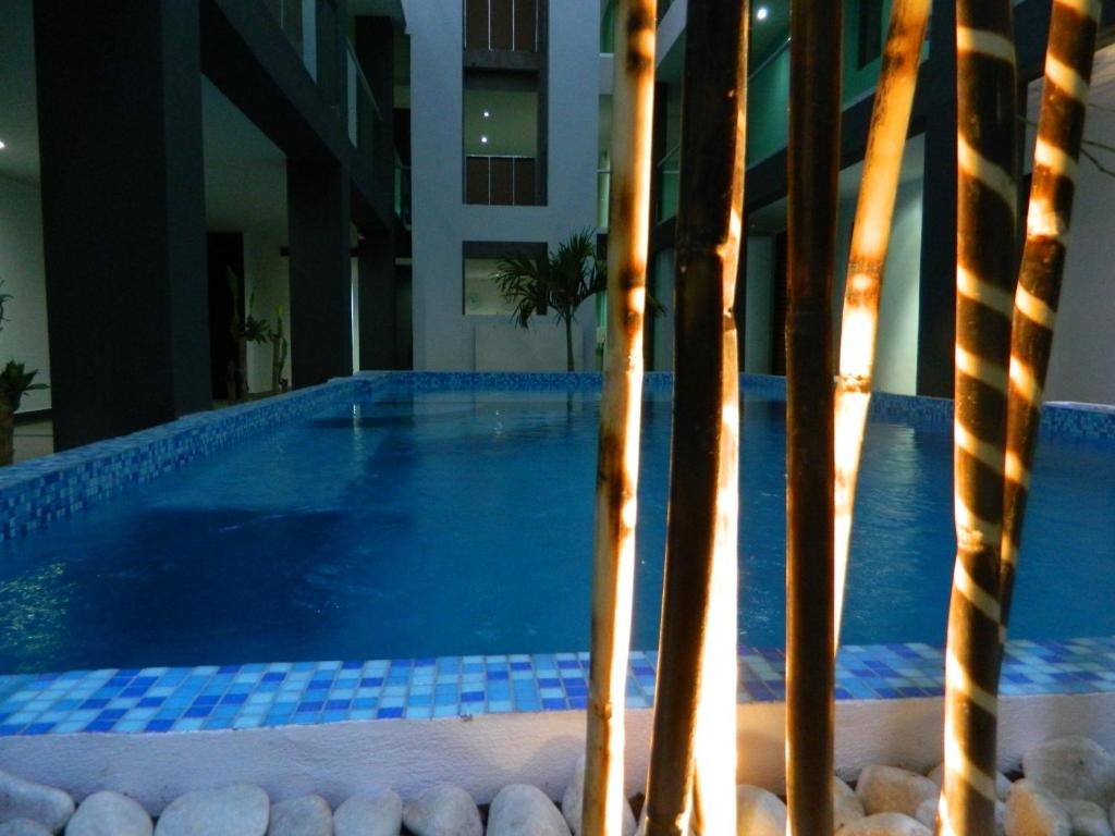 Bazén v ubytování Hotel Flamingo Merida nebo v jeho okolí