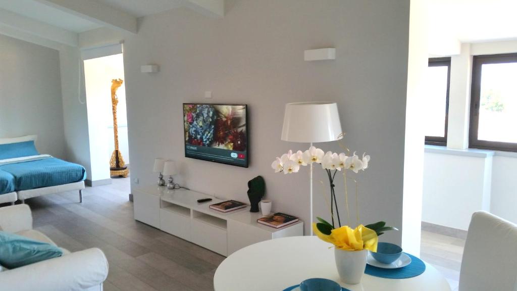 TV a/nebo společenská místnost v ubytování B&B Unique