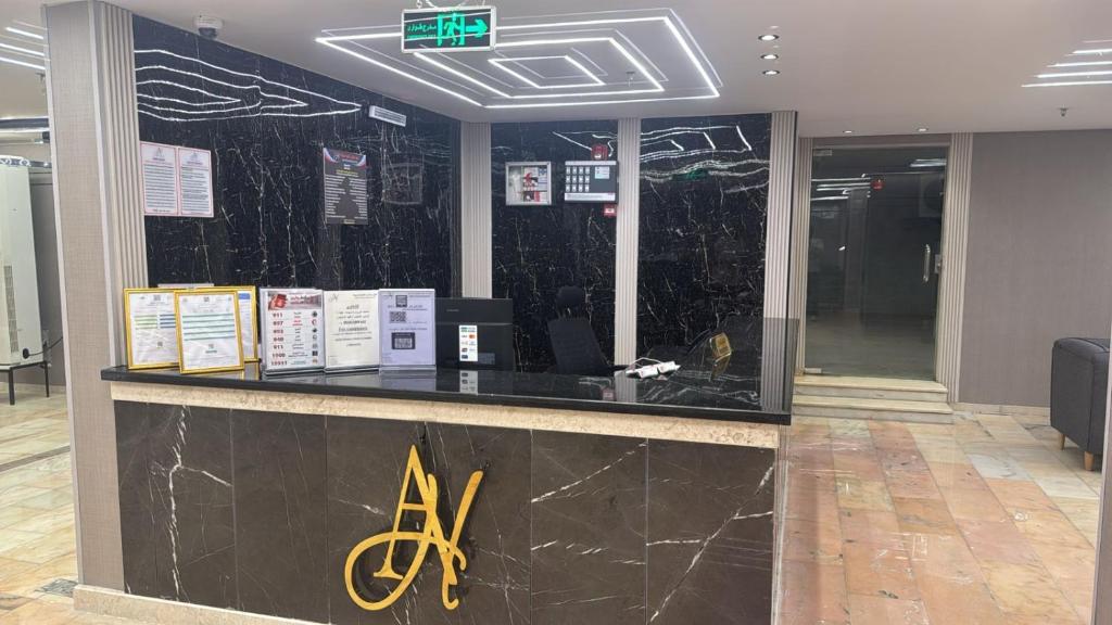a store counter with a sign on it in a building at حياة العرب in Jeddah