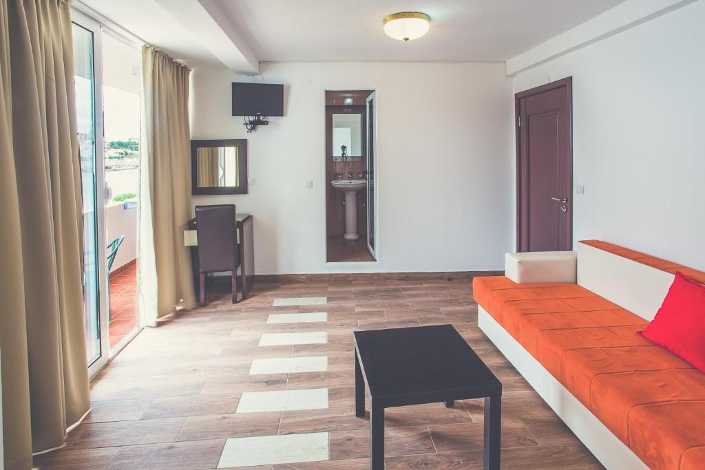 TV a/nebo společenská místnost v ubytování David apartments and rooms