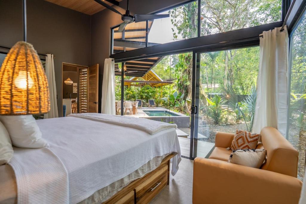 Postel nebo postele na pokoji v ubytování Villa Asencia with pool and AC near Arrecife beach