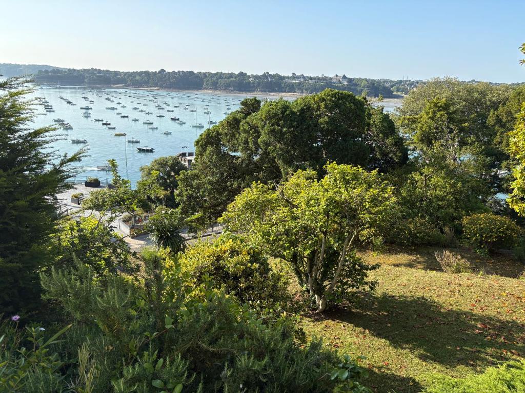 a view of a river with boats in the water at Escapade à la mer studio in Dinard