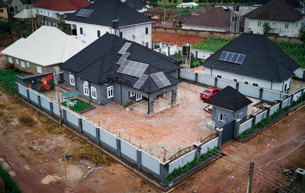 an overhead view of a house with solar panels on it at Ay crib 