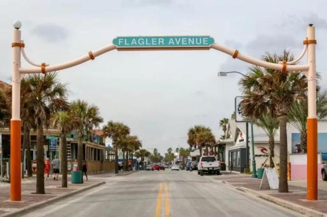 a street sign that reads ranger avenue on a city street at Walk to Beach, Pool & Flagler! Relaxed Condo with Balcony & Full Kitchen in Chicken Island