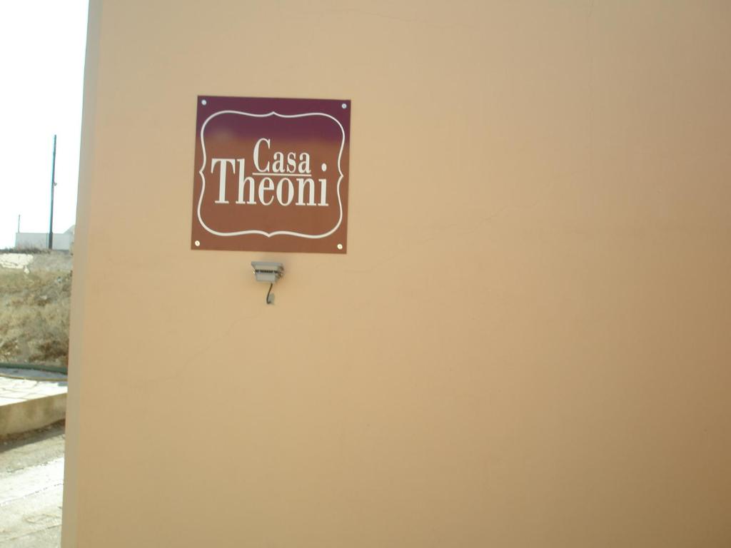 a sign on a wall that says im class therapy at Casa Theoni in Kattavía
