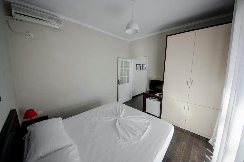Postel nebo postele na pokoji v ubytování Kadrisa Hotel
