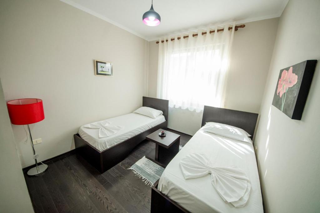 Postel nebo postele na pokoji v ubytování Kadrisa Hotel