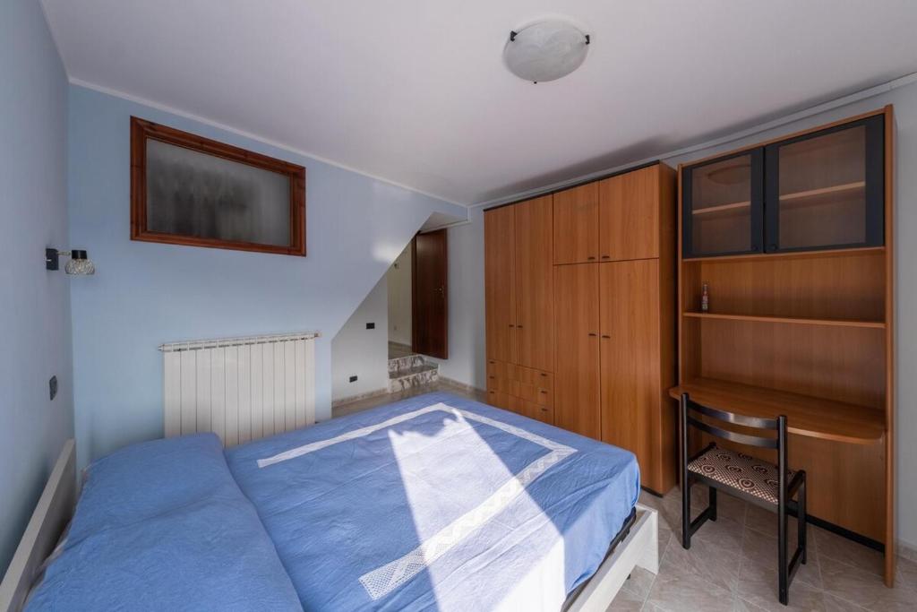 En eller flere senge i et værelse på Casa vacanze Casalena