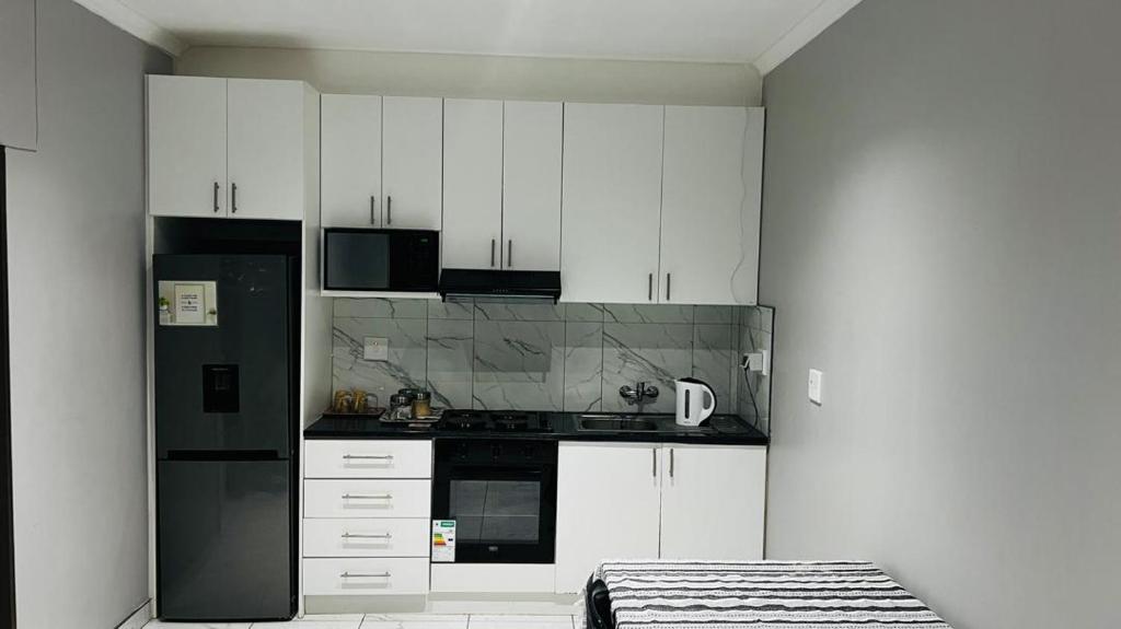 Una cocina o cocineta en MARI Guesthouse