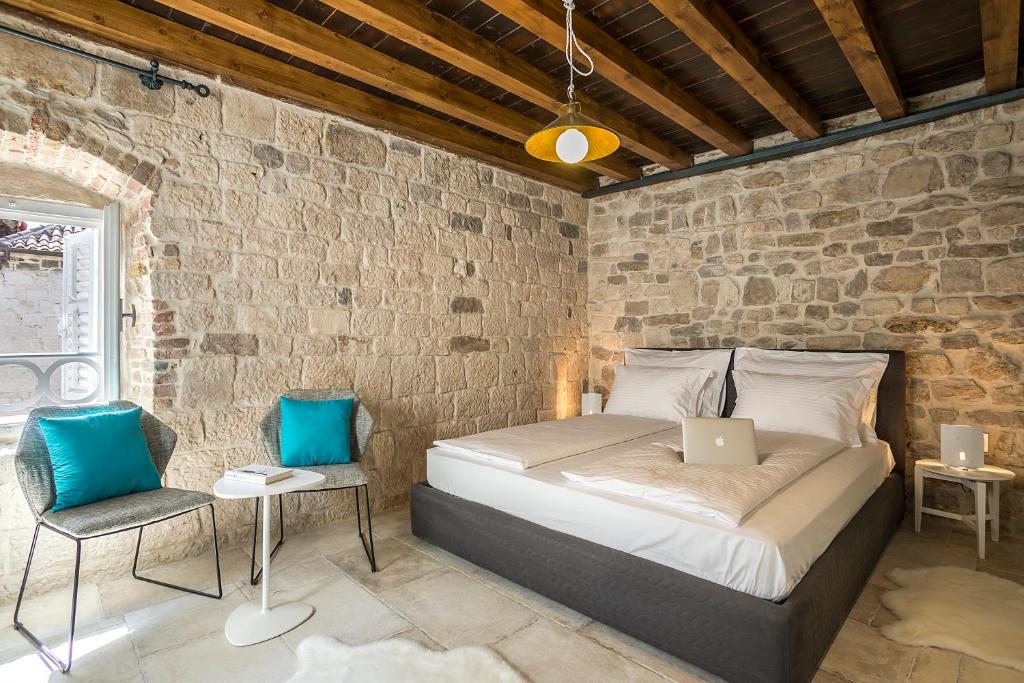 Posteľ alebo postele v izbe v ubytovaní Bella Notte Di Spalato