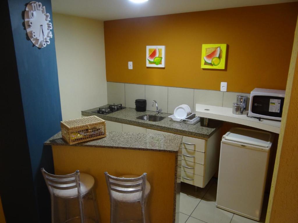 Kuchyň nebo kuchyňský kout v ubytování Apartamento Em Andar Alto com Vista Mar Meireles
