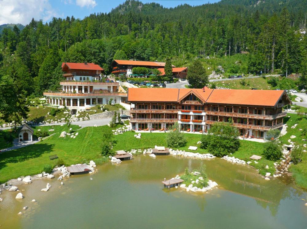 an aerial view of a resort with a lake at Feuriger Tatzlwurm in Oberaudorf