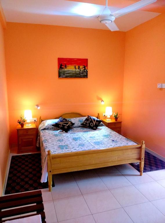 Postel nebo postele na pokoji v ubytování Basilico Homestay