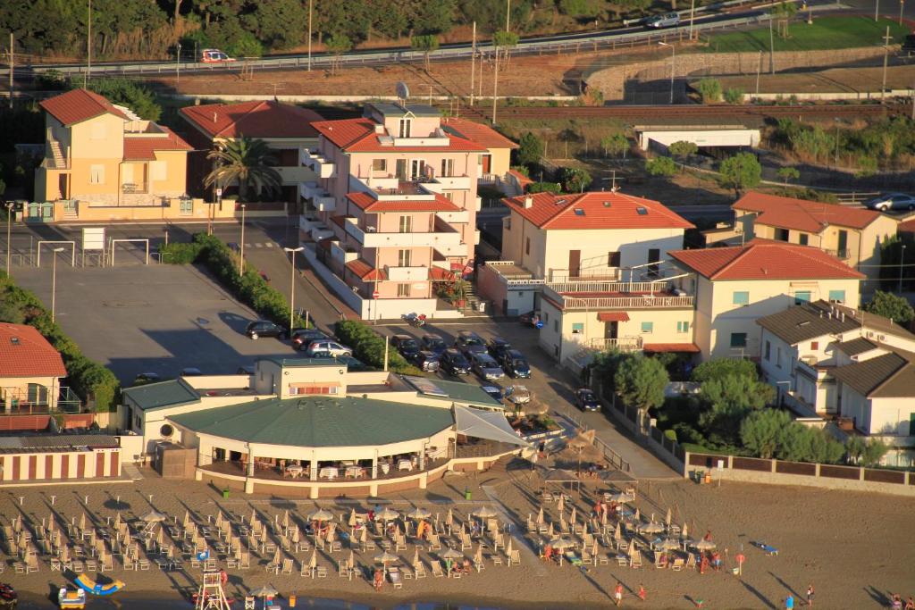 an aerial view of a town with a building at Hotel del Sole in San Vincenzo