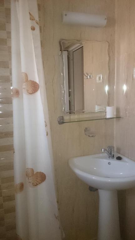 Koupelna v ubytování Zoi Residence