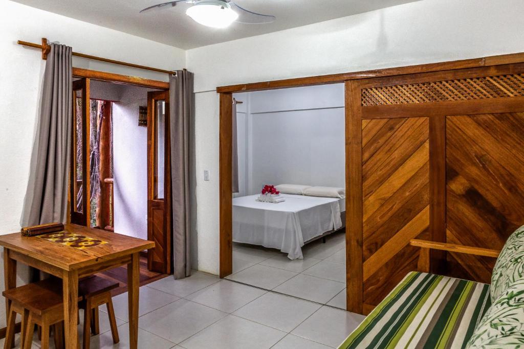 Postel nebo postele na pokoji v ubytování Arpoador Flat