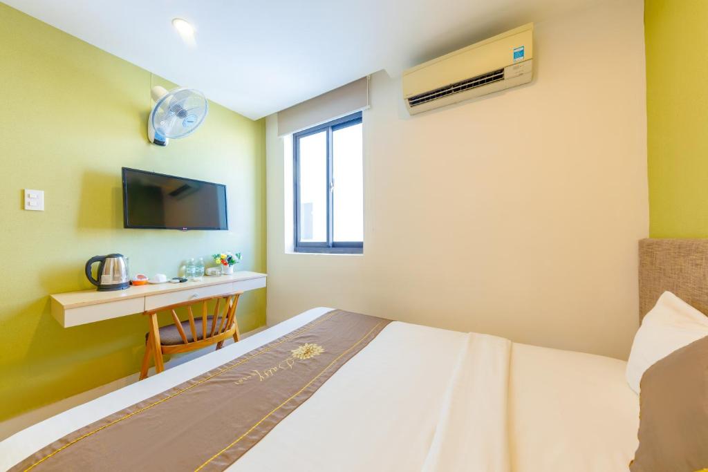 Giường trong phòng chung tại Daisy Flower Nha Trang