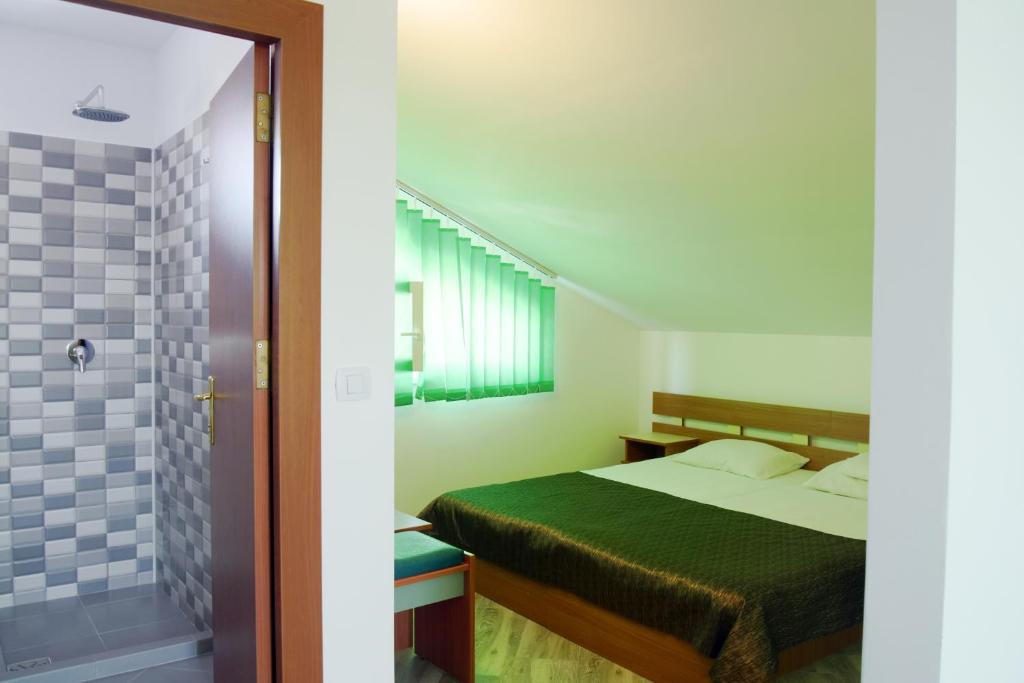 Postel nebo postele na pokoji v ubytování Casa Omer