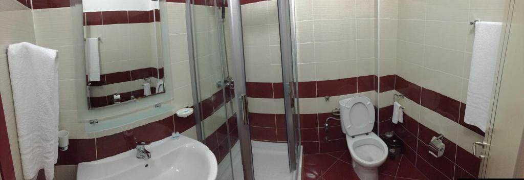 Koupelna v ubytování Hotel Siklad