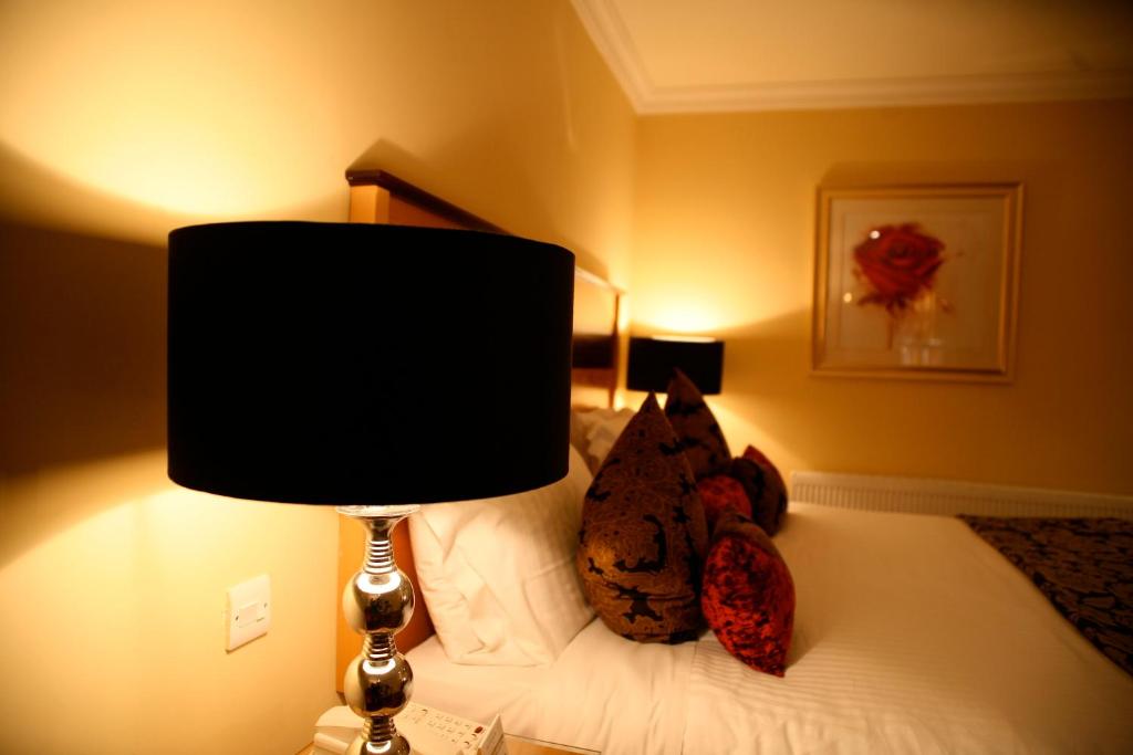 Letto o letti in una camera di The Fairview Boutique Hotel