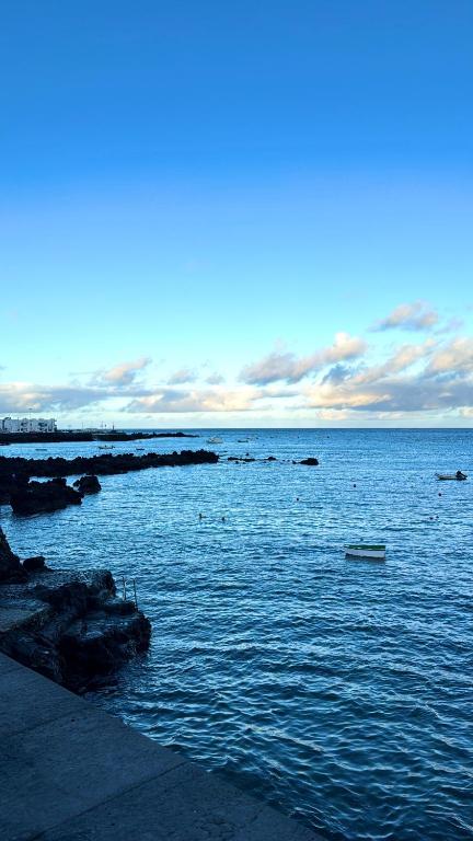a view of a large body of water at Casa Corina. Primera línea de mar in Punta Mujeres
