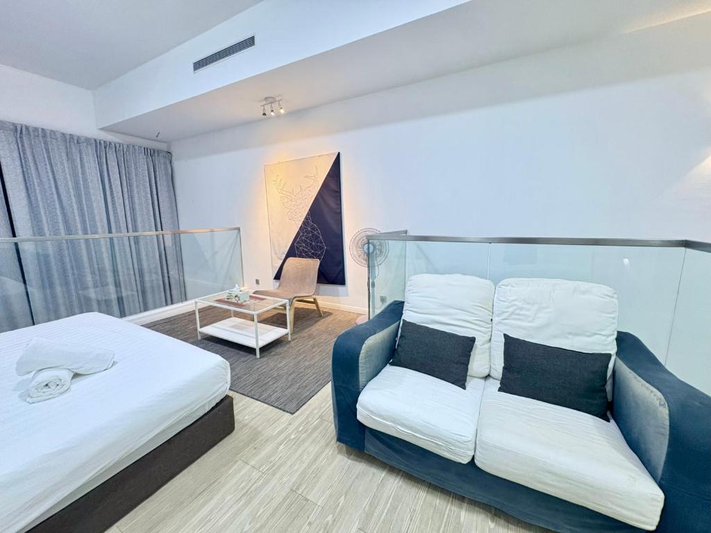 Postel nebo postele na pokoji v ubytování Mcity Deluxe Duplex at Jalan Ampang