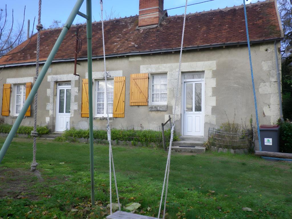 a house with yellow shutters on the windows at Gîte 132, Cœur Châteaux in Noyers-sur-Cher