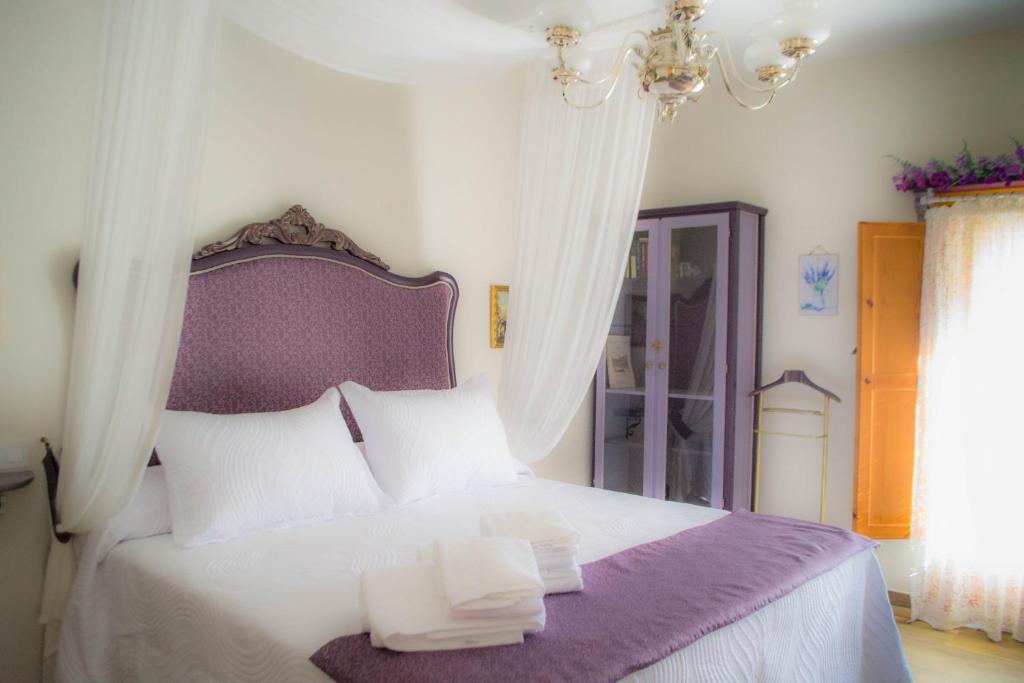 Postel nebo postele na pokoji v ubytování Casa Rural Aromas de Siempre