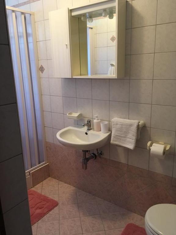 Koupelna v ubytování Apartments Wagner