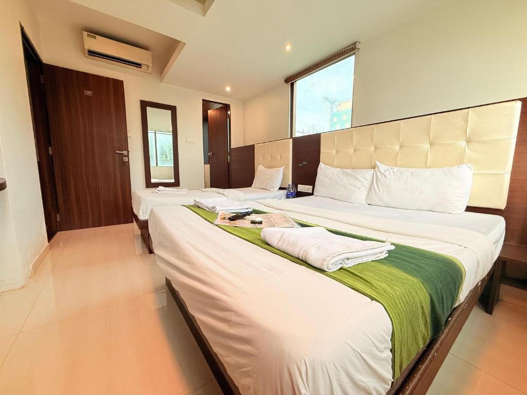 تصویر اتاق‌های Hotel Artusinn midc andheri east - تصویر ۲
