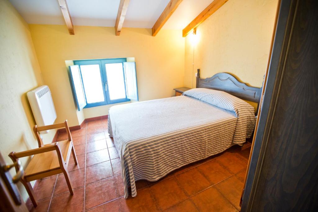 Postel nebo postele na pokoji v ubytování Casa Pedroso