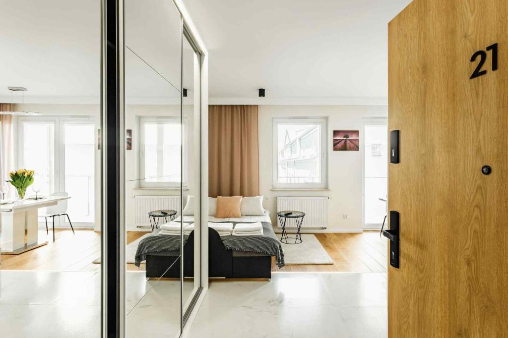Ένα ή περισσότερα κρεβάτια σε δωμάτιο στο Apartament Plac Litewski 21