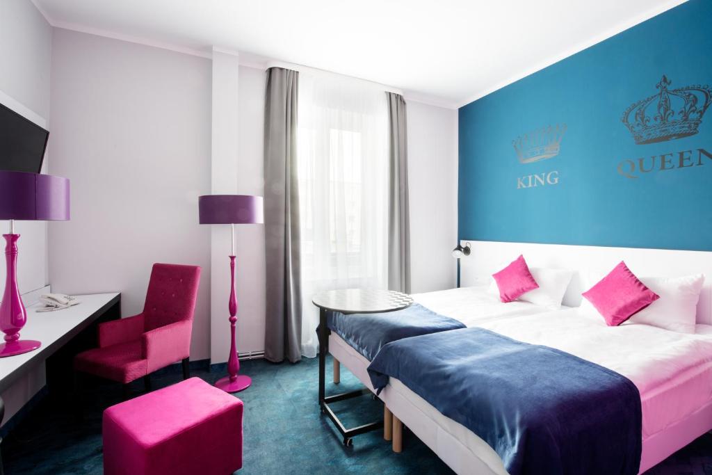 Posteľ alebo postele v izbe v ubytovaní Ibis Styles Gniezno Stare Miasto