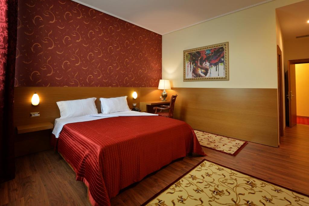 Postel nebo postele na pokoji v ubytování Hotel Austria