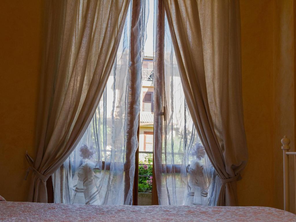 A bed or beds in a room at Il Sestante