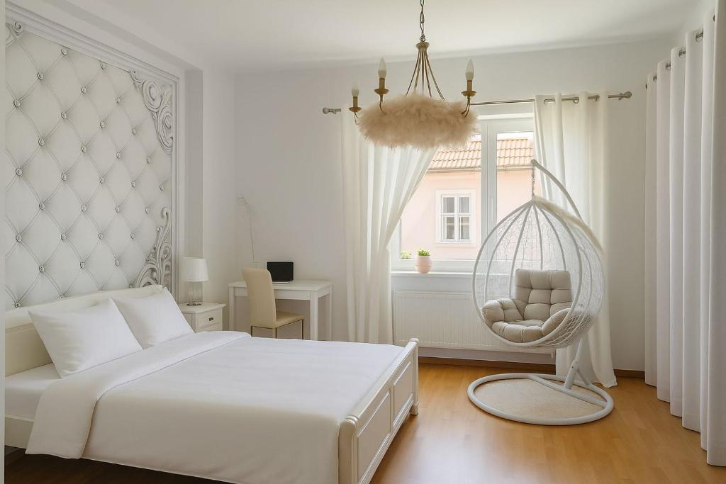 Ένα ή περισσότερα κρεβάτια σε δωμάτιο στο Albert Residence