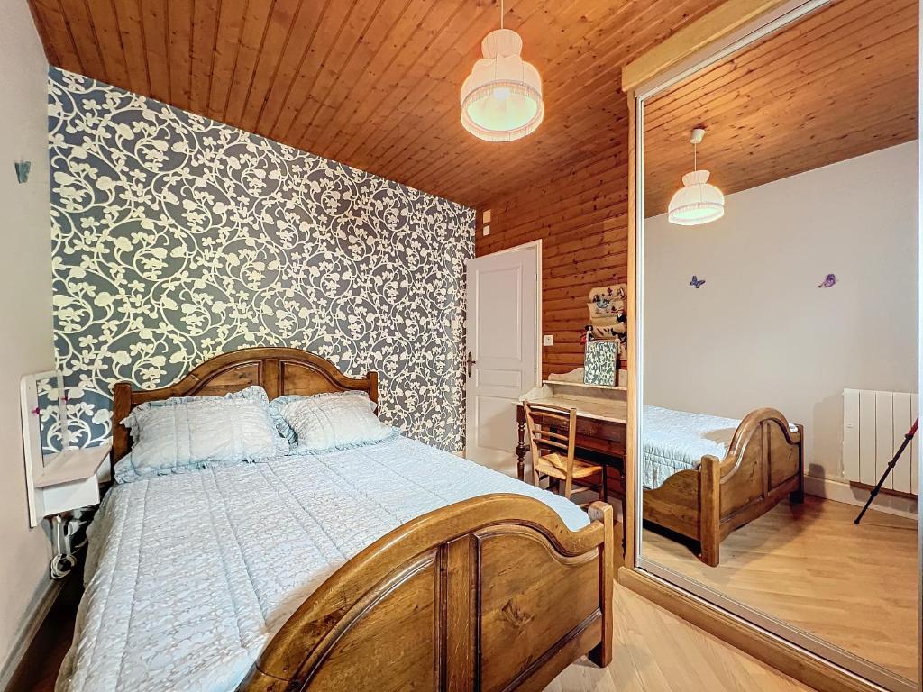 Postel nebo postele na pokoji v ubytování Maison de Montagne Chez Mamie Gaby