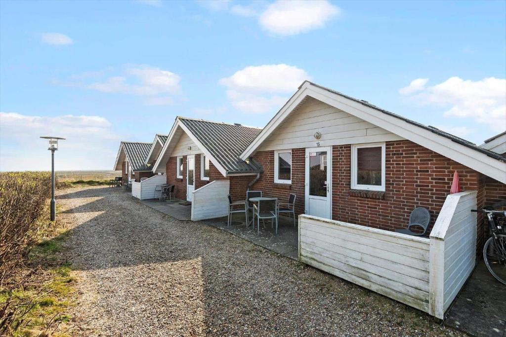 a row of houses parked in a field at 0415-Romo-Vestergade-3-Ap-15 in Havneby