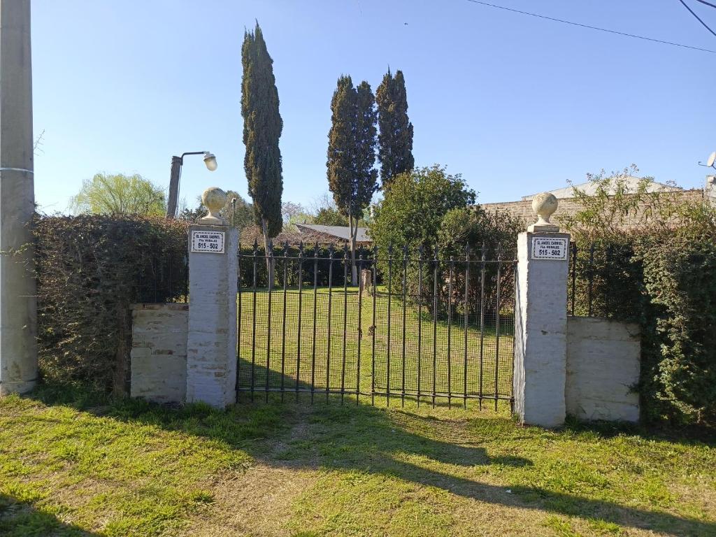 a wrought iron gate in front of a yard at Quinta "El Ángel Gabriel" in Gowland