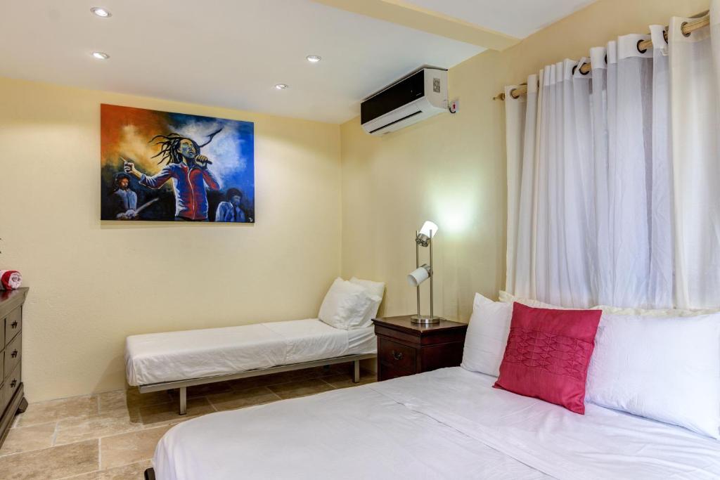 Ένα ή περισσότερα κρεβάτια σε δωμάτιο στο Sandrati Villa